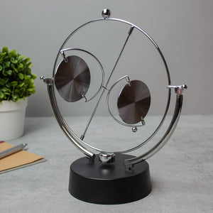 Ingenious Perpetual Mobile Desk Accessory image 0