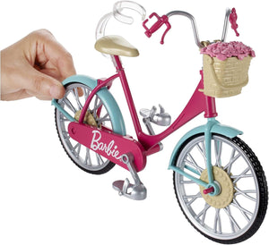 Vélo Barbie avec panier de fleurs