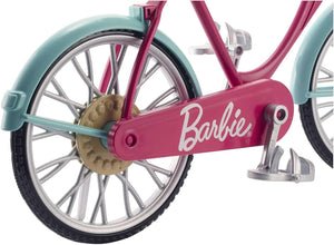 Vélo Barbie avec panier de fleurs