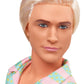 Poupée Ken du film Barbie, vêtue d'un ensemble de plage à rayures roses et vertes pastel assorties.