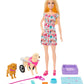 Poupée Barbie avec un chiot en peluche et un chien en fauteuil roulant