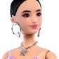 Barbie Deluxe Style Doll #11 in Pink Denim Star-Print Dress with Matching Tights, Black Hair in High Bun, Accessories like Handbag and Jewelry, JJN71