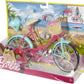 Vélo Barbie avec panier de fleurs