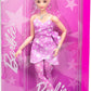 Barbie Deluxe Style Doll #11 in Pink Denim Star-Print Dress with Matching Tights, Black Hair in High Bun, Accessories like Handbag and Jewelry, JJN71